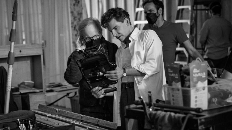 Producer Steven Spielberg and Writer/Director/Producer Bradley Cooper as Leonard Bernstein on the set of 'Maestro.'